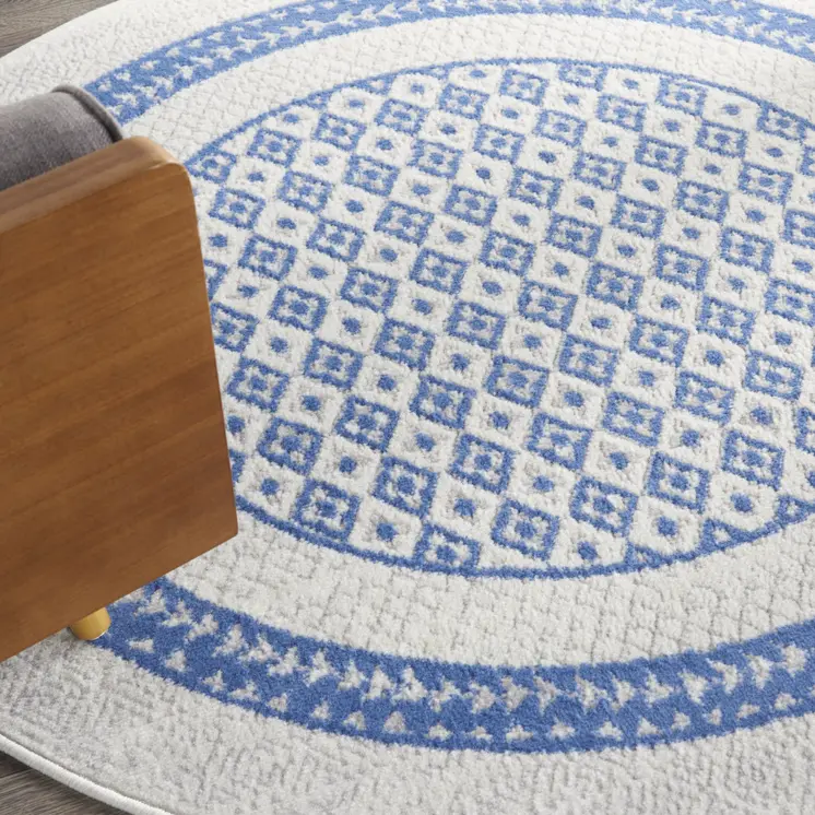 5' Ivory and Blue Geometric Distressed Round Rug