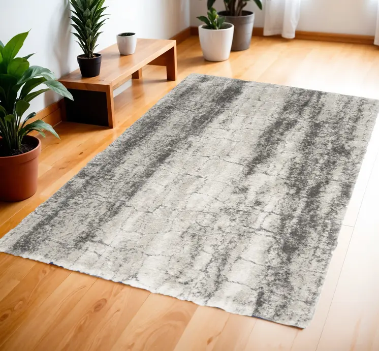 4' X 6' Charcoal and Ivory Abstract Shag Area Rug
