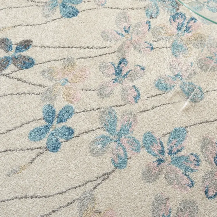 4' X 6' Ivory And Blue Floral Area Rug