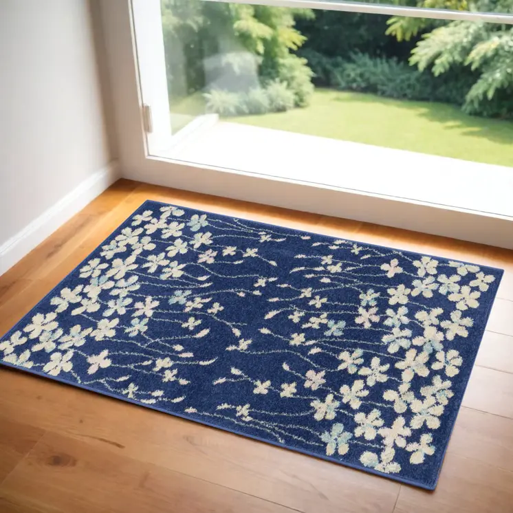 2' X 4' Navy Blue and Ivory Floral Area Rug