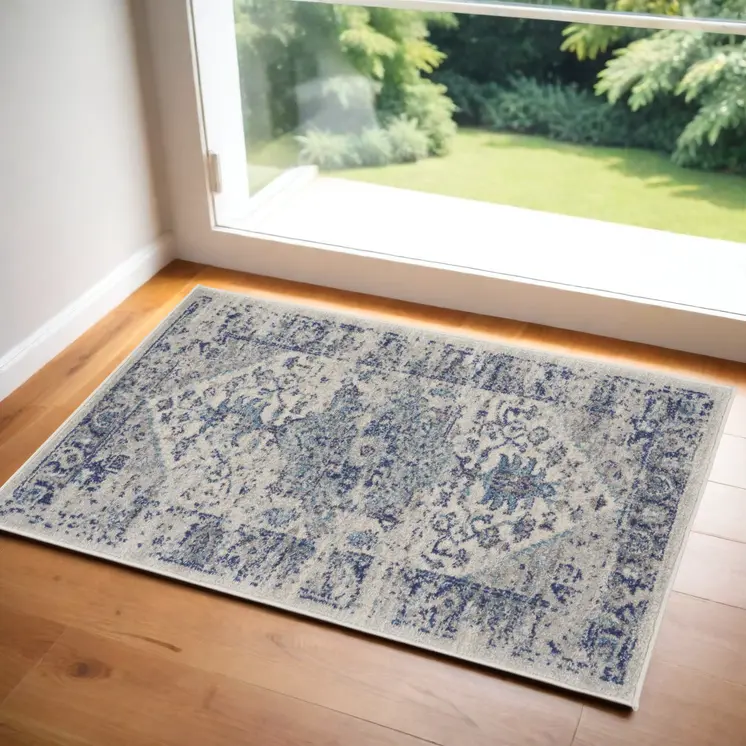 2' X 4' Ivory And Light Blue Floral Medallion Distressed Area Rug