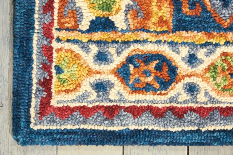 5' X 8' Navy Blue Orange And Green Wool Floral Hand Tufted Distressed Area Rug