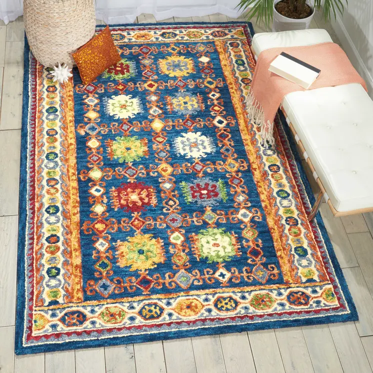 5' X 8' Navy Blue Orange And Green Wool Floral Hand Tufted Distressed Area Rug