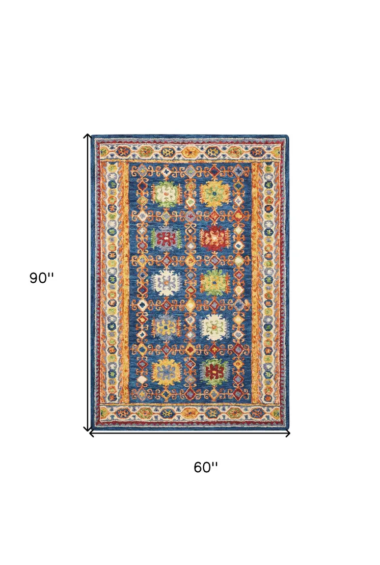 5' X 8' Navy Blue Orange And Green Wool Floral Hand Tufted Distressed Area Rug