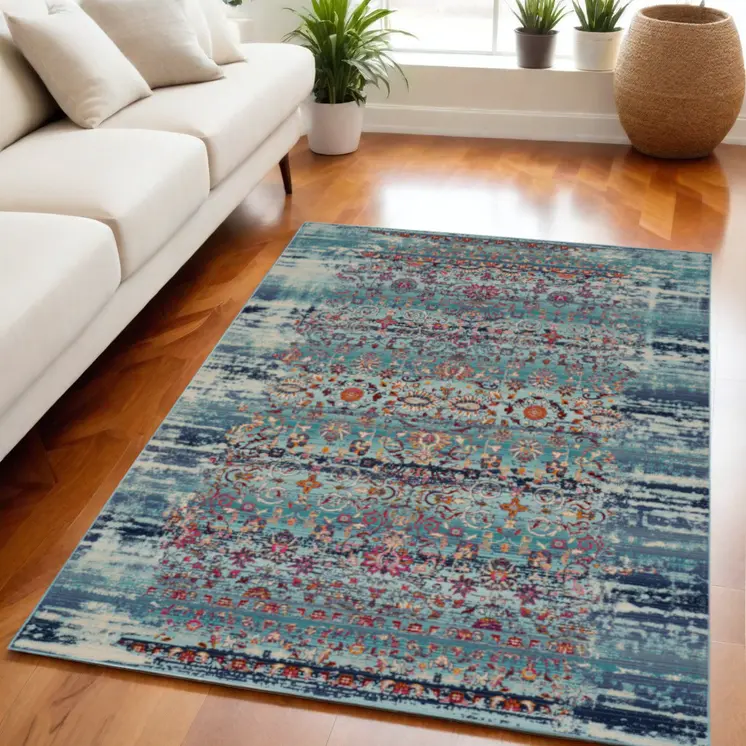 5' X 8' Blue Red And Orange Floral Distressed Area Rug