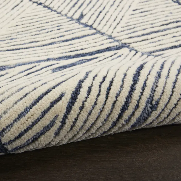 5' X 7' Blue And White Wool Abstract Area Rug