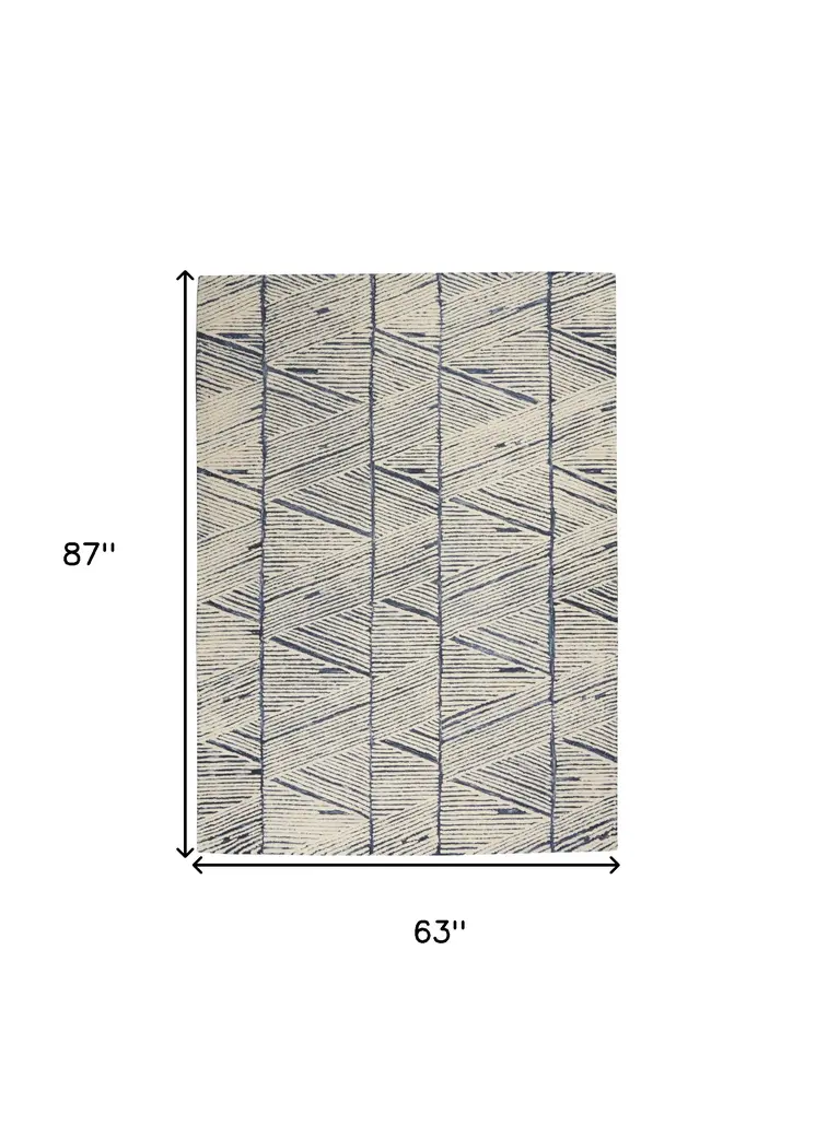5' X 7' Blue And White Wool Abstract Area Rug