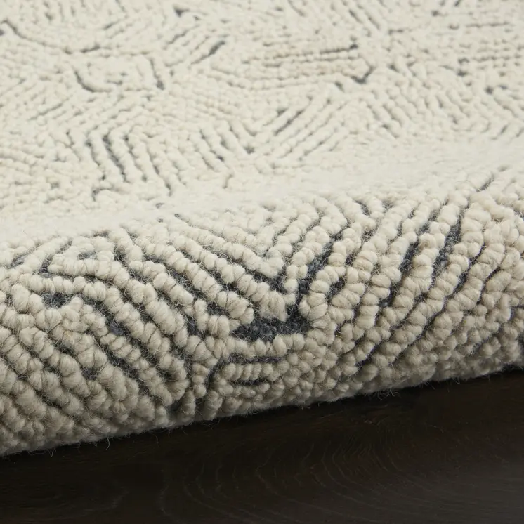5' X 7' Navy Blue and Ivory Wool Abstract Area Rug