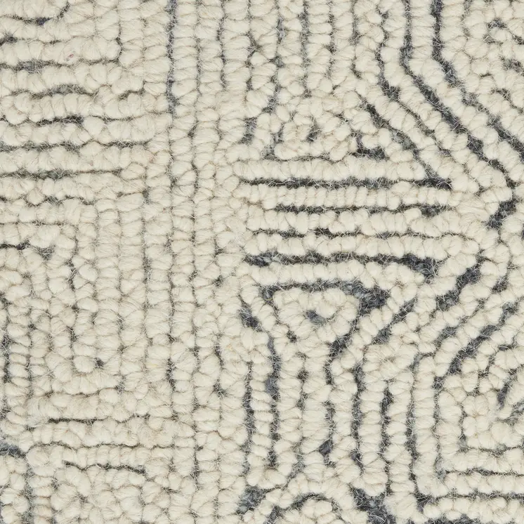 5' X 7' Navy Blue and Ivory Wool Abstract Area Rug