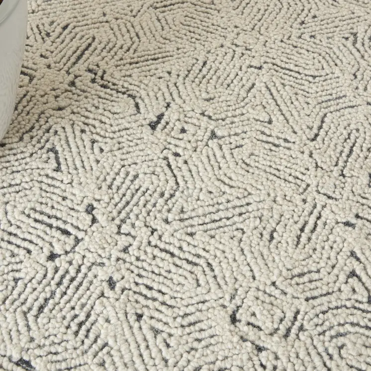 5' X 7' Navy Blue and Ivory Wool Abstract Area Rug