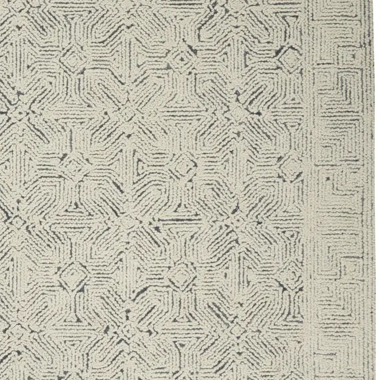 5' X 7' Navy Blue and Ivory Wool Abstract Area Rug