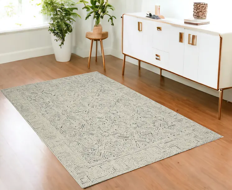 4' X 6' Navy Blue and Ivory Wool Abstract Area Rug