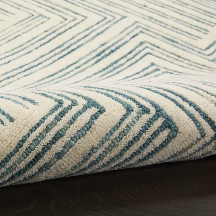 5' X 8' Ivory And Turquoise Wool Geometric Area Rug