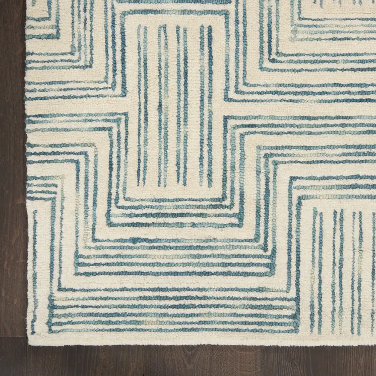 5' X 8' Ivory And Turquoise Wool Geometric Area Rug