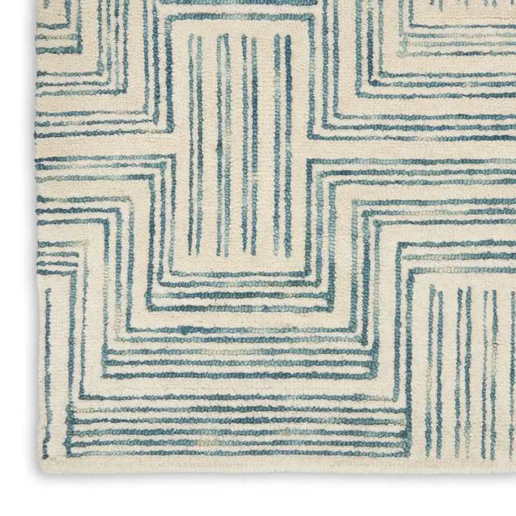 5' X 8' Ivory And Turquoise Wool Geometric Area Rug