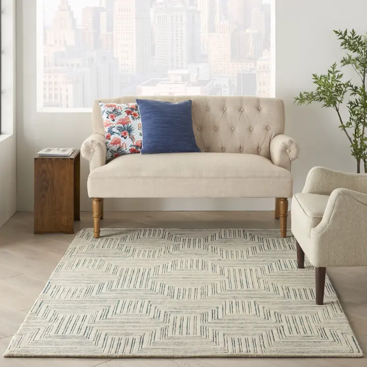 5' X 8' Ivory And Turquoise Wool Geometric Area Rug