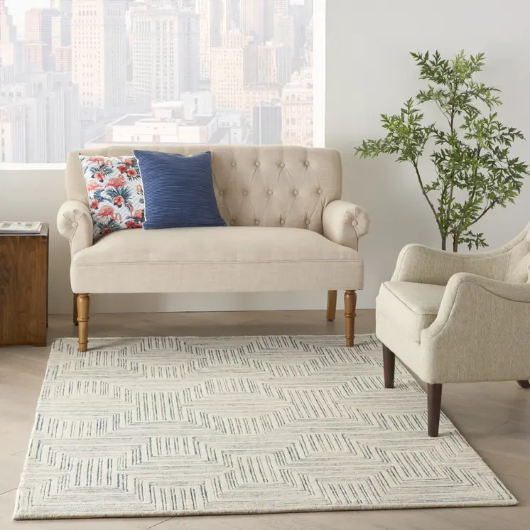 5' X 8' Ivory And Turquoise Wool Geometric Area Rug