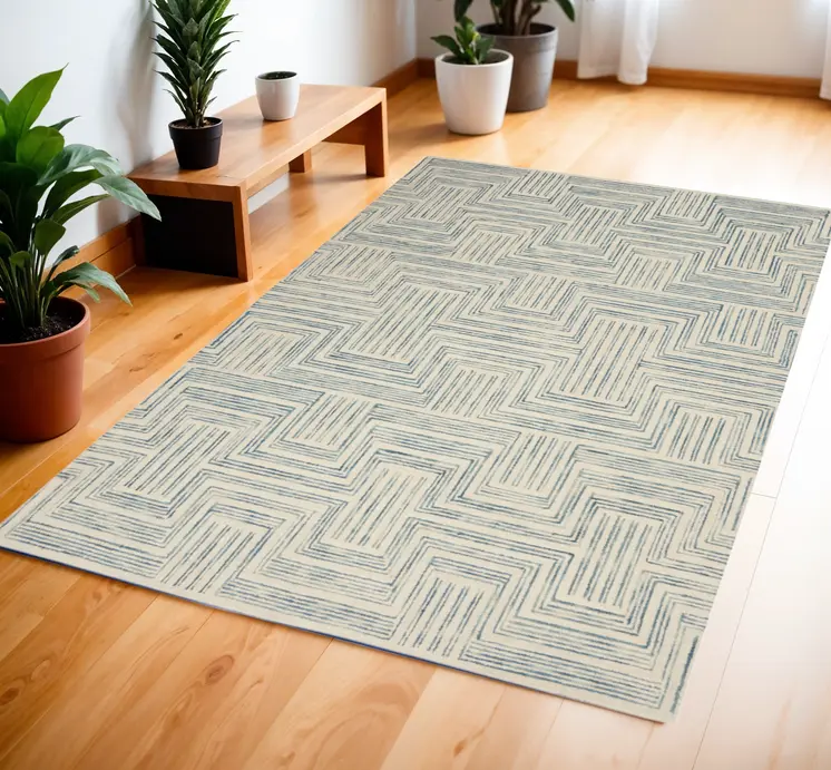 4' X 6' Ivory And Turquoise Wool Geometric Area Rug