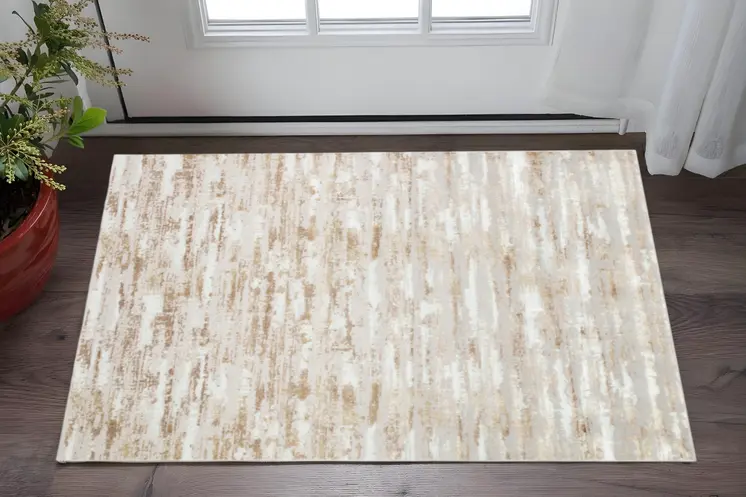 3' X 5' Beige Ivory And Off White Abstract Washable Area Rug