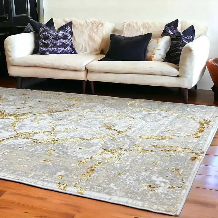 8' X 11' Beige and Gold Abstract Area Rug