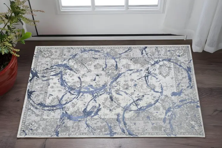 3' X 5' Ivory Blue And Gray Abstract Area Rug