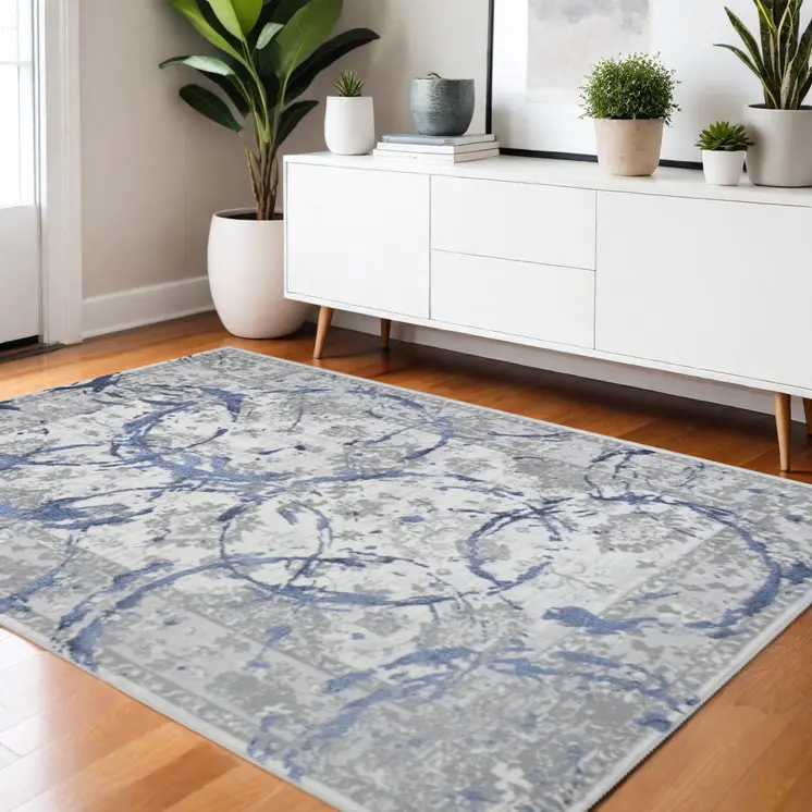 4' X 6' Ivory Blue And Gray Abstract Area Rug