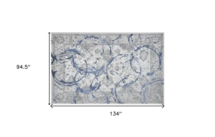 8' X 11' Ivory Blue And Gray Abstract Area Rug