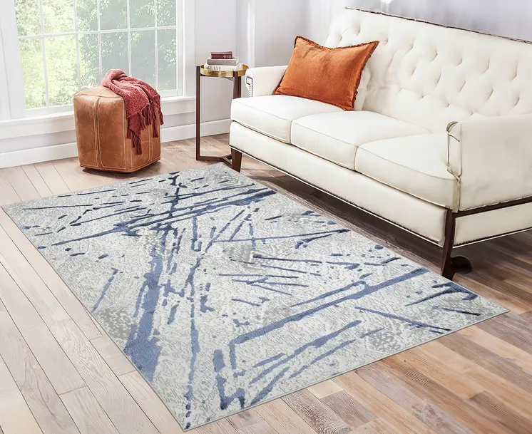 4' X 6' Ivory and Blue Abstract Area Rug