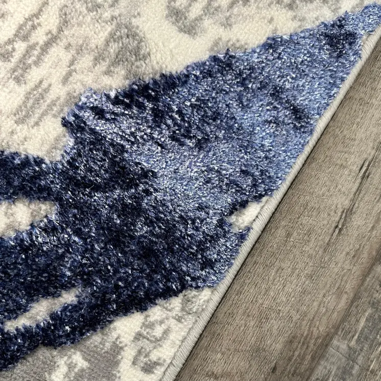 8' X 11' Ivory and Blue Abstract Area Rug