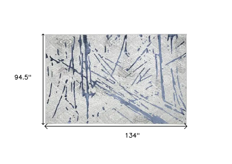 8' X 11' Ivory and Blue Abstract Area Rug