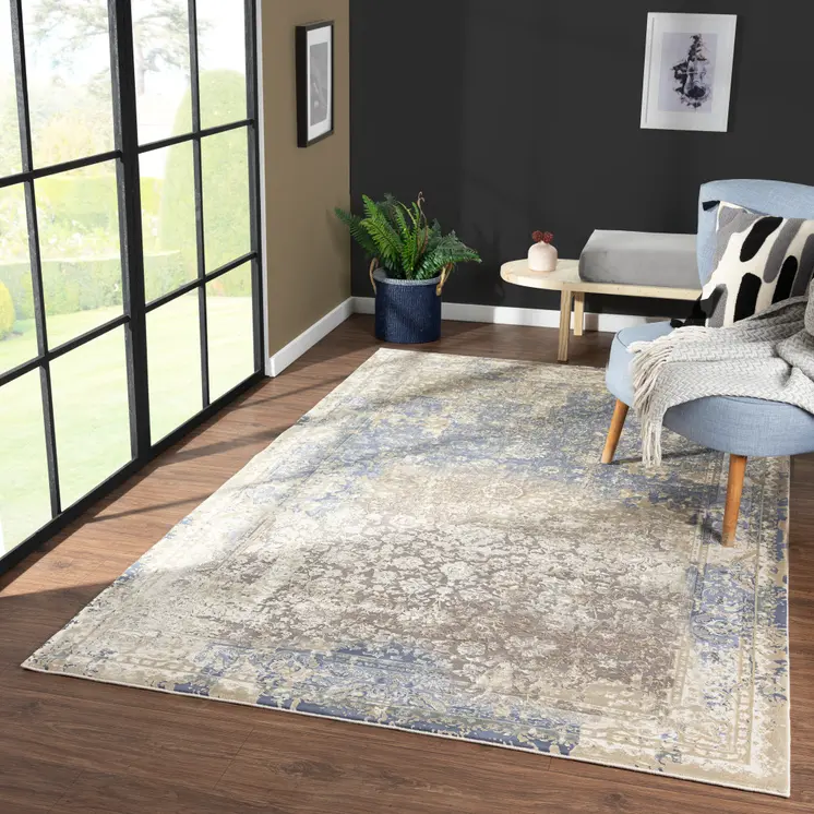 5' X 8' Blue and Ivory Floral Area Rug