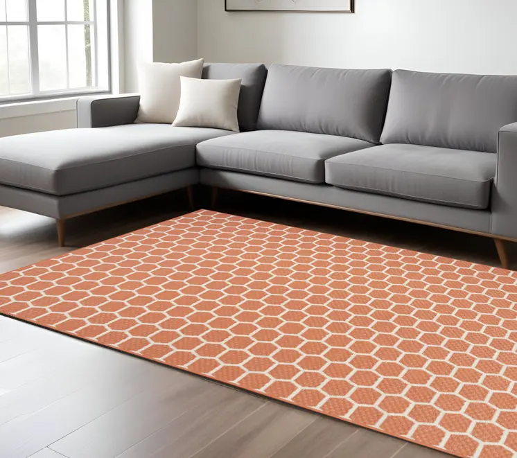 6' X 9' Coral And Ivory Geometric Indoor Outdoor Area Rug