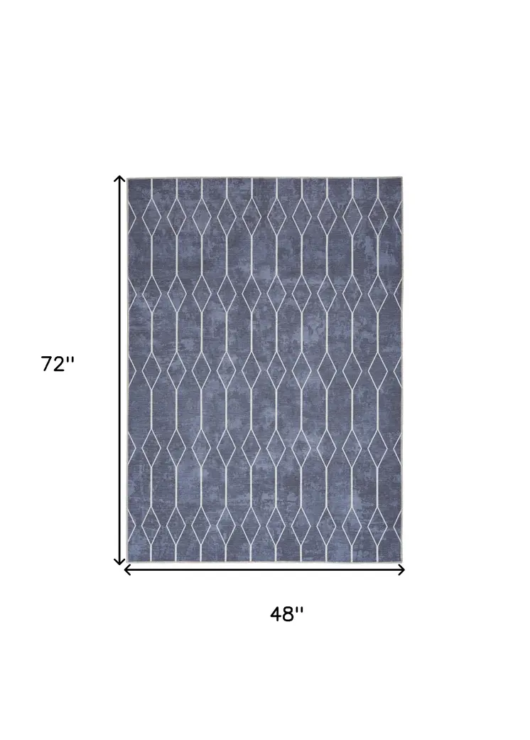 4' X 6' Blue And Ivory Geometric Area Rug