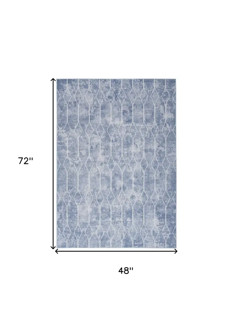 4' X 6' Blue and Ivory Geometric Power Loom Area Rug