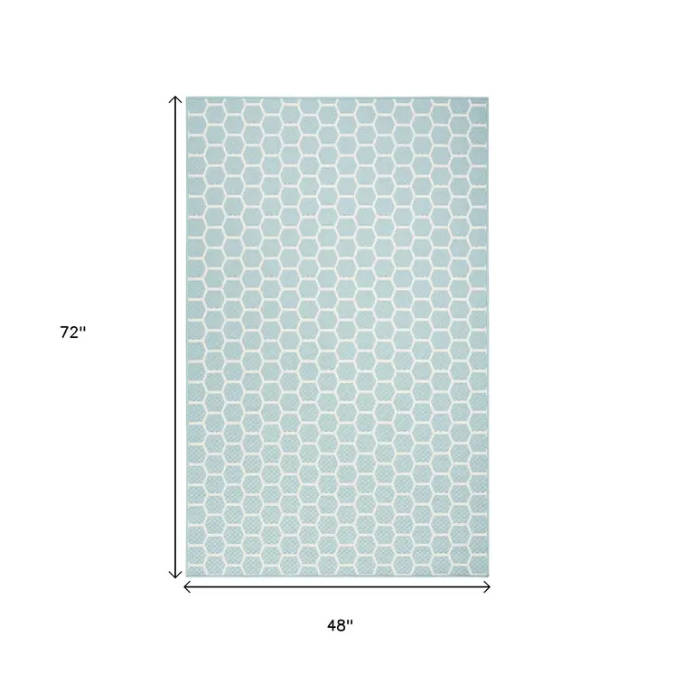 5' X 7' Aqua And Ivory Geometric Indoor Outdoor Area Rug