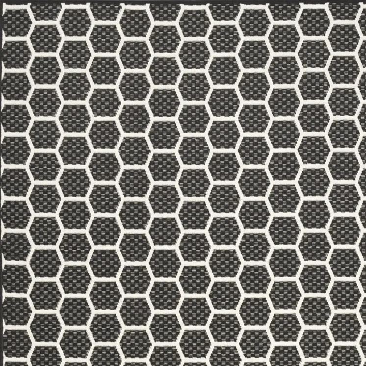 5' X 7' Black And Ivory Geometric Indoor Outdoor Area Rug