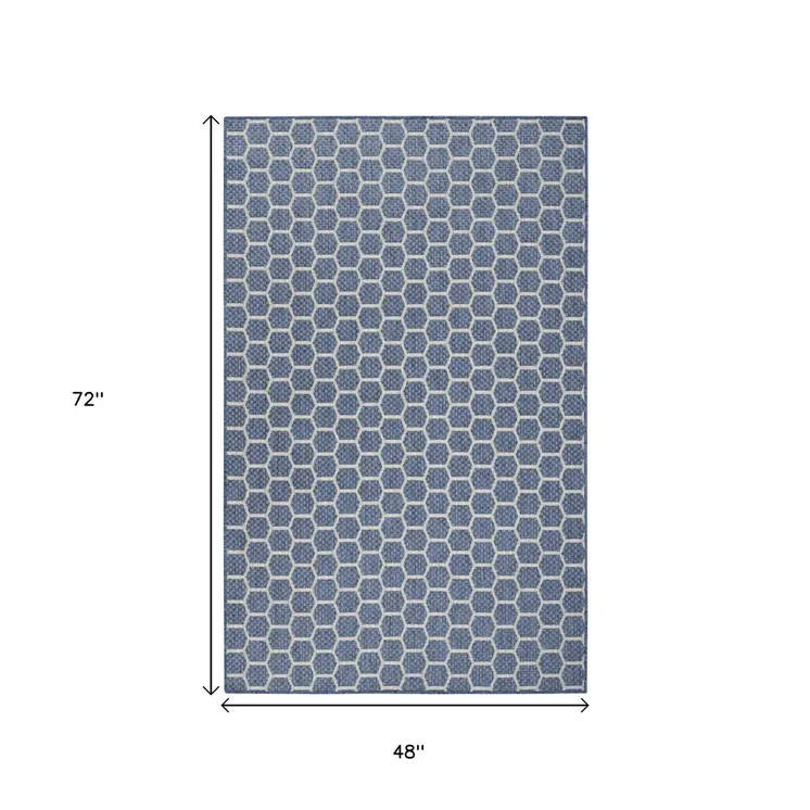 5' X 7' Blue And Ivory Geometric Indoor Outdoor Area Rug