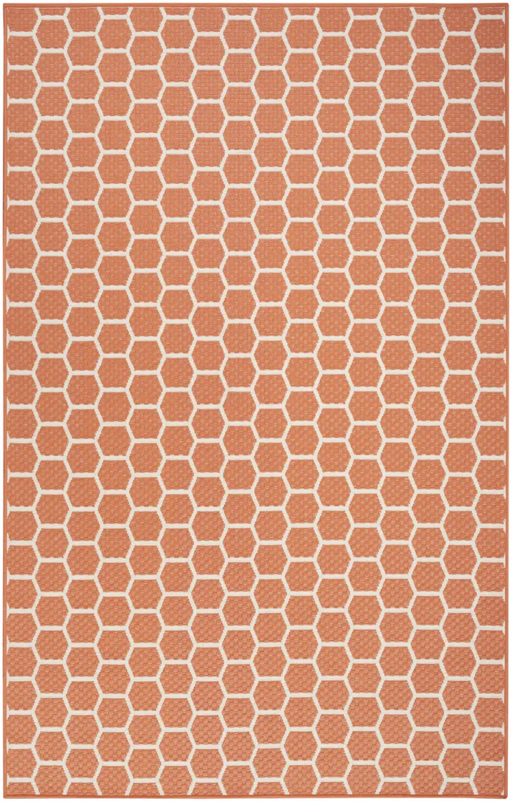 5' X 7' Coral And Ivory Geometric Indoor Outdoor Area Rug