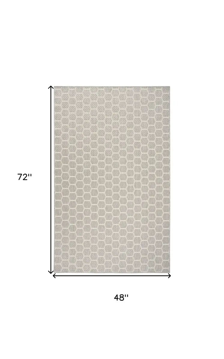 5' X 7' Gray And Ivory Geometric Indoor Outdoor Area Rug