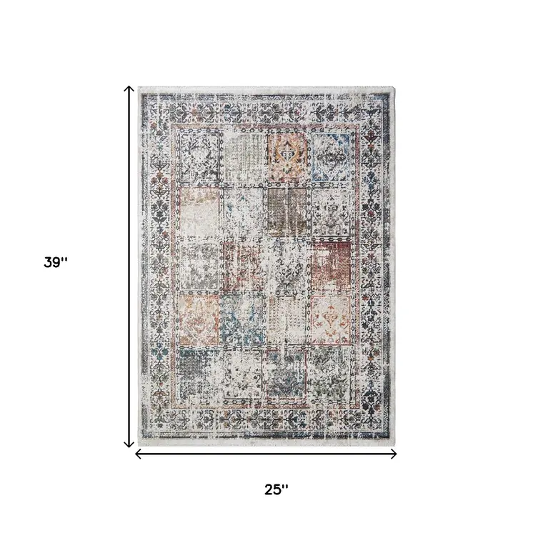 2' X 3' Ivory Blue and Gray Patchwork Distressed Area Rug With Fringe