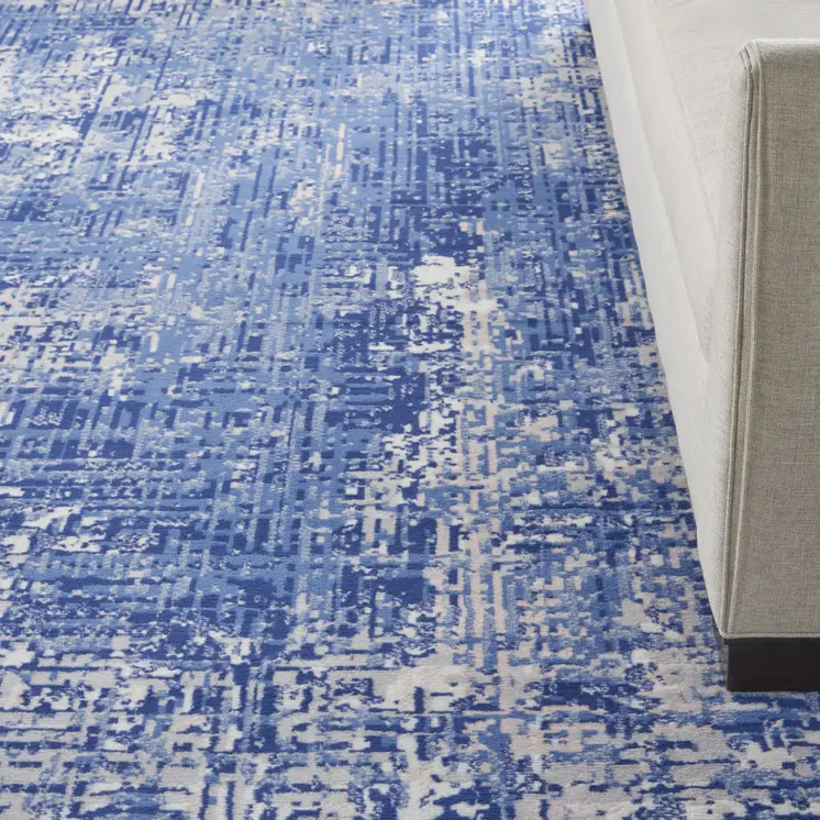 8' X 12' Ivory and Blue Abstract Distressed Area Rug