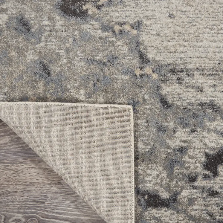 2' X 4' Gray Beige and Ivory Abstract Area Rug