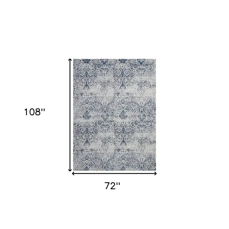 6' X 9' Navy Blue And Ivory Damask Distressed Area Rug