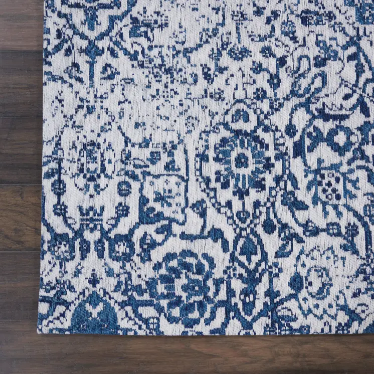 6' X 9' Navy Blue And Ivory Damask Distressed Area Rug