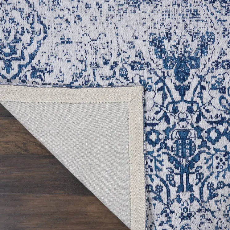 6' X 9' Navy Blue And Ivory Damask Distressed Area Rug