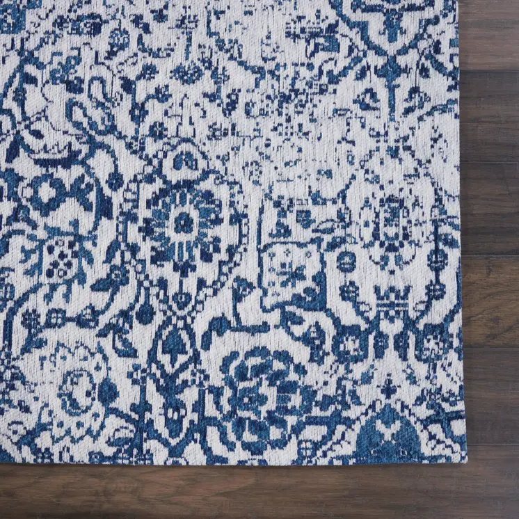 6' X 9' Navy Blue And Ivory Damask Distressed Area Rug