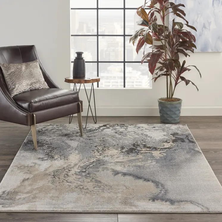 5' X 7' Gray Blue and Ivory Abstract Area Rug