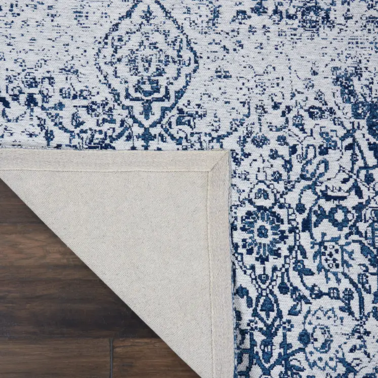 8' X 10' Navy Blue And Ivory Damask Distressed Area Rug