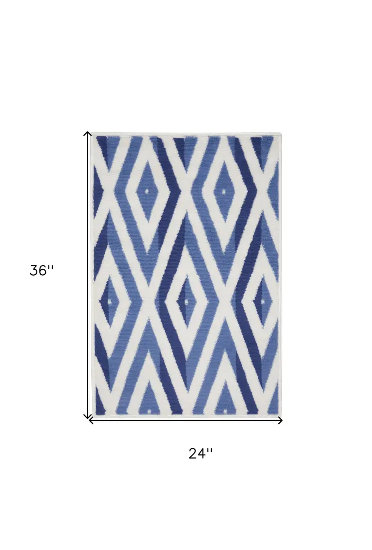 2' X 3' Ivory and Blue Geometric Area Rug
