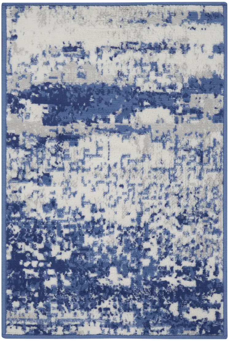 2' X 3' Ivory And Navy Blue Abstract Area Rug
